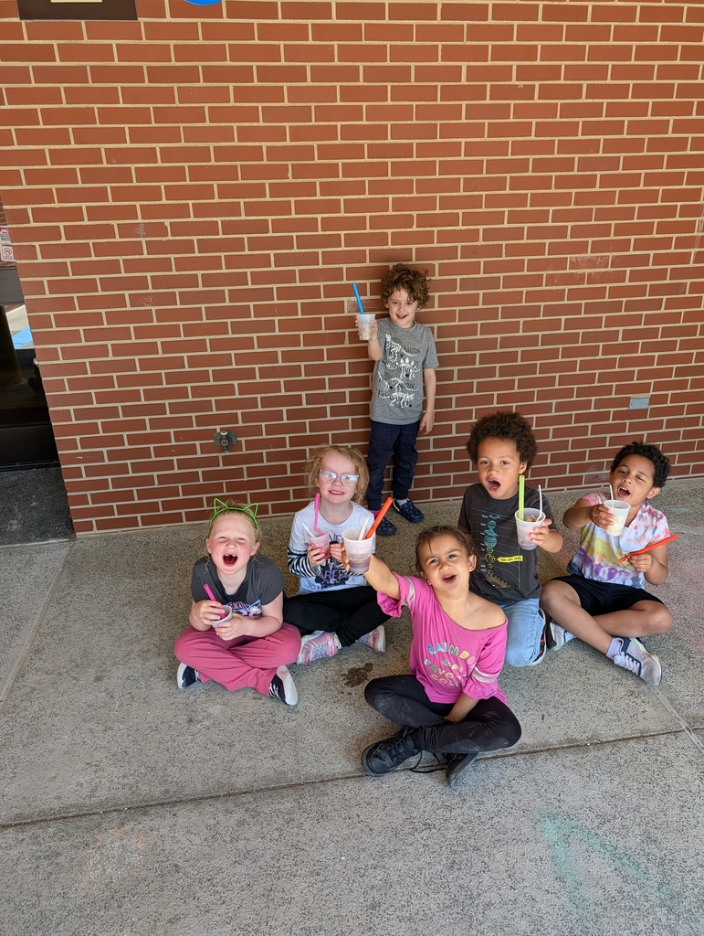 Students eating snow cones outside