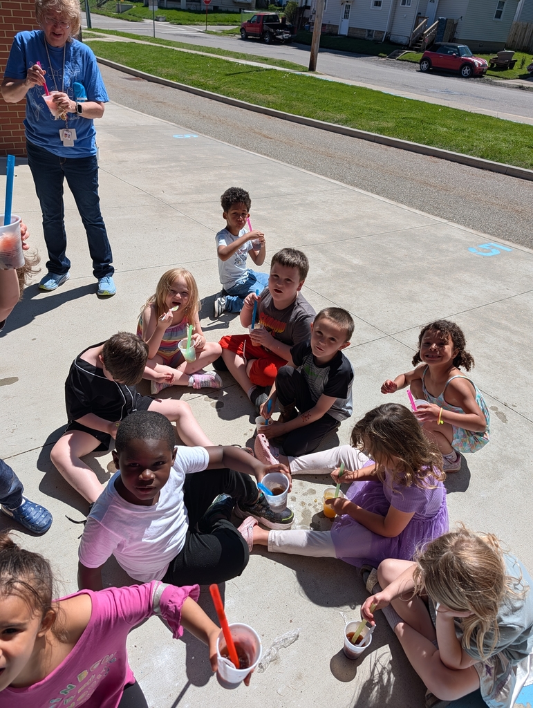 Students eating snow cones outside