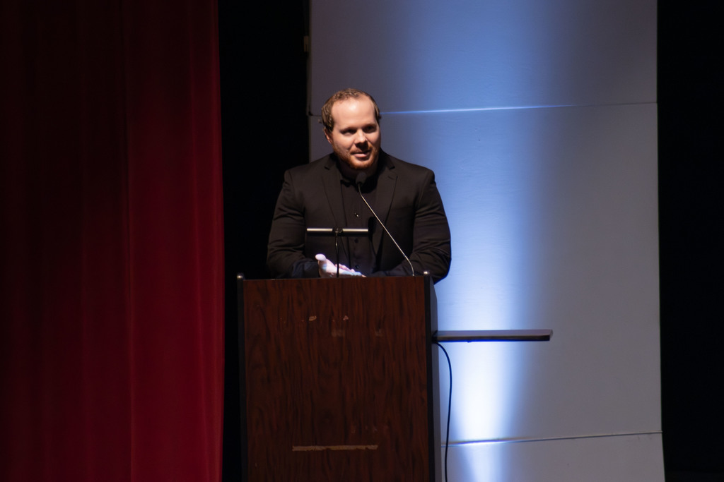 Assistant Band director Nathan Fete welcomes the audience to the 2026 AHS Jazz Festival