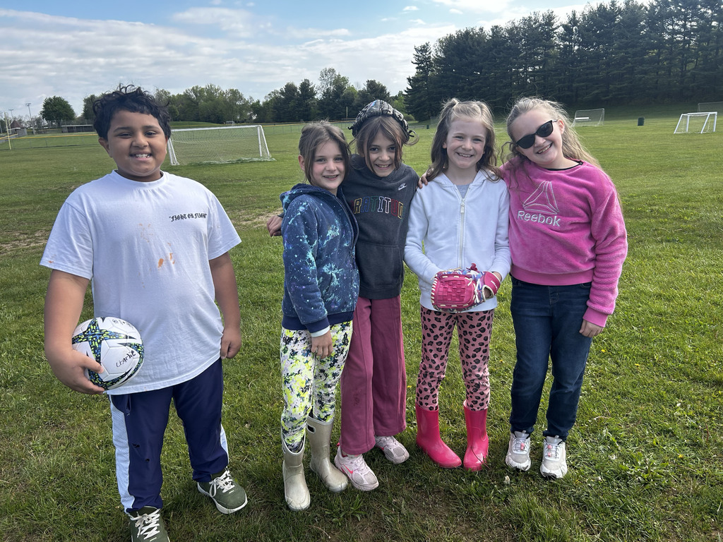 Students smiling while at the park