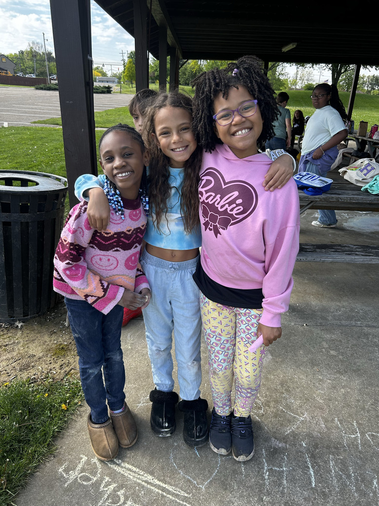 Students smiling while at the park