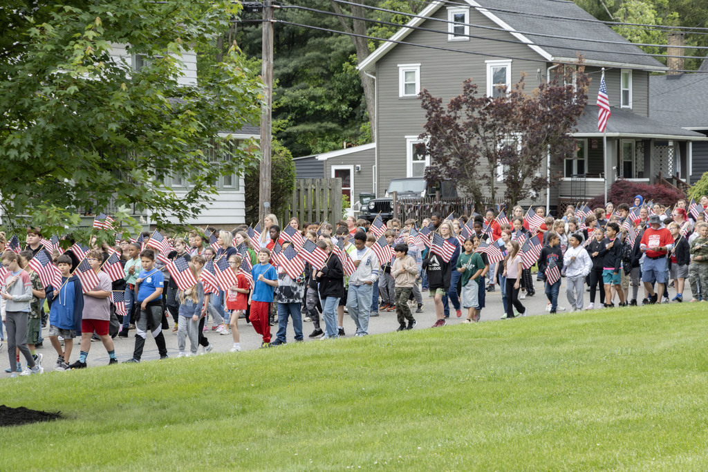Students walking to the cemetery