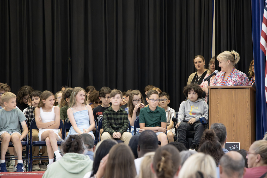 Principal Herdman addresses the 5th grade students