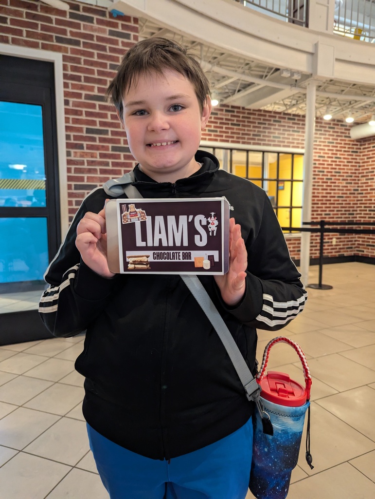 Liam Jackson holding a  custom candy bar he made
