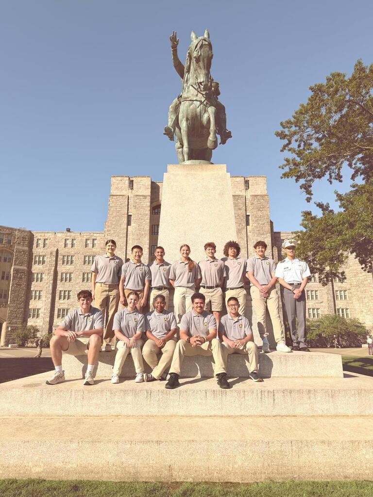 Trent standing with his platoon