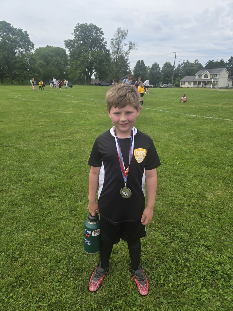 Clynton in his soccer uniform