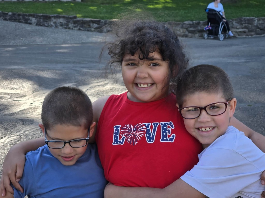 The three hugging for a picture