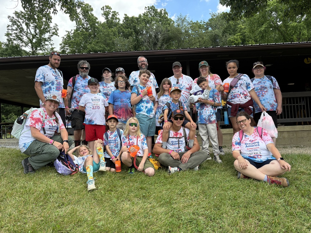 Group picture of everyone wearing tie dye tshirts