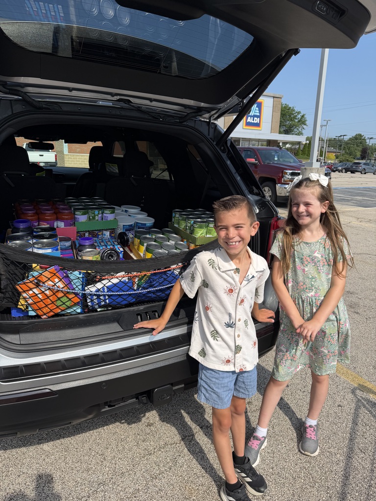 Cora and Henry with all the items in their car.