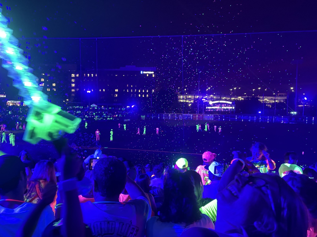 picture of the stadium in the dark with neon colors