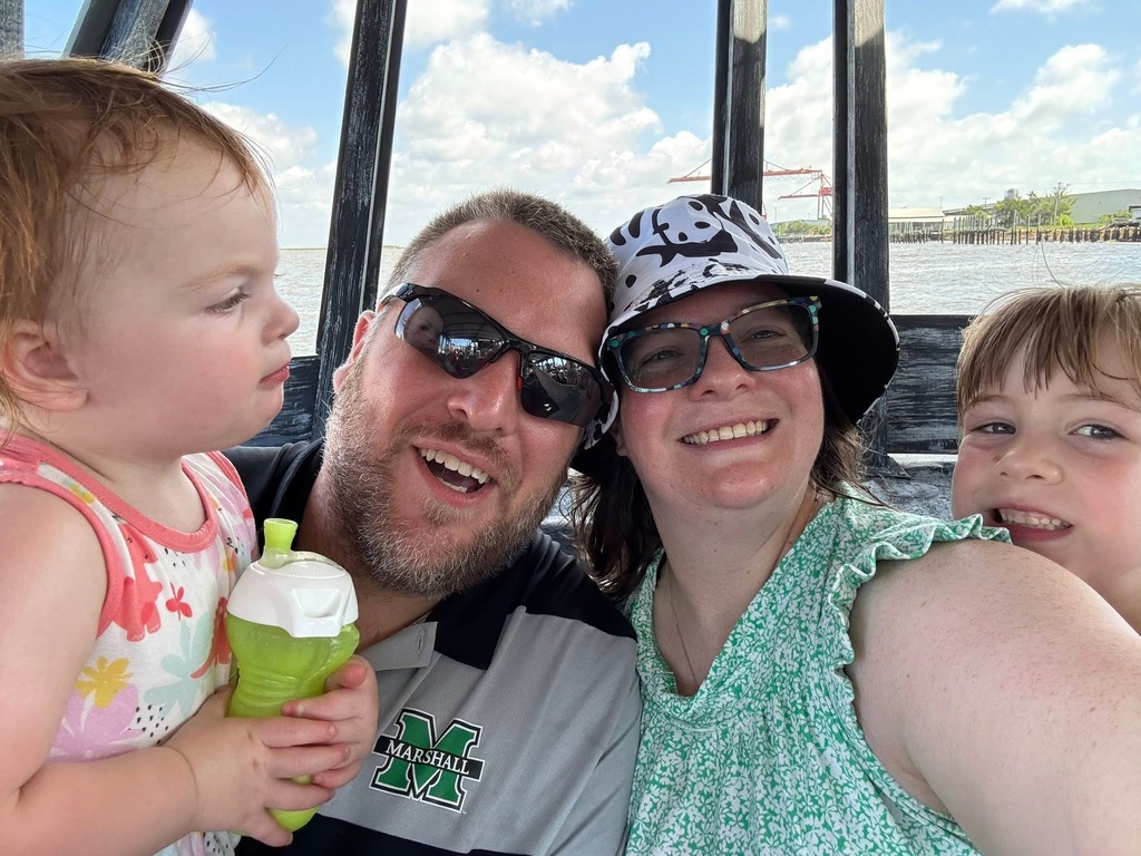The Winland family on a boat