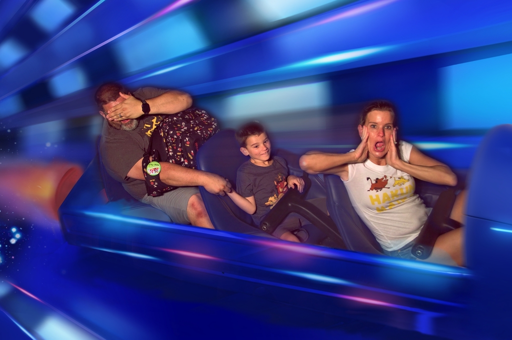 Nick on a ride with his parents