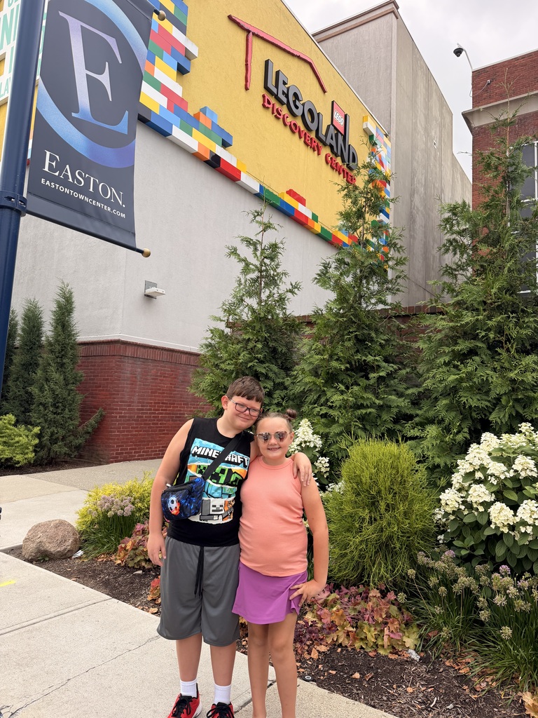 Jacob & Julie standing next to Julie