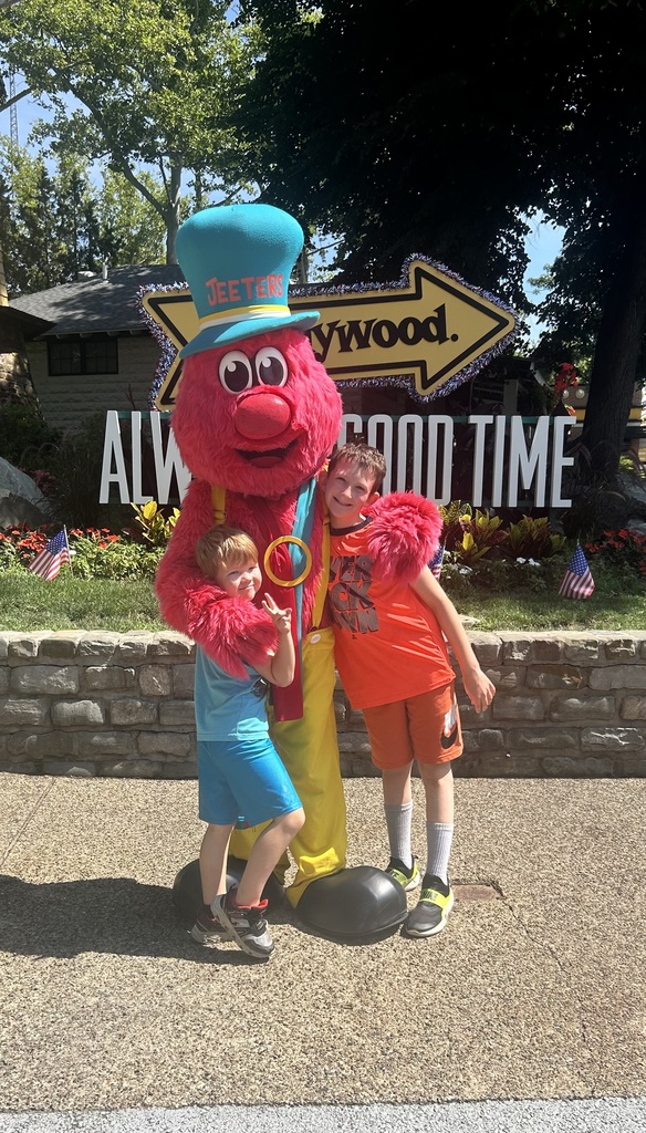 Timothy and Brently with a character mascot at Kennywood