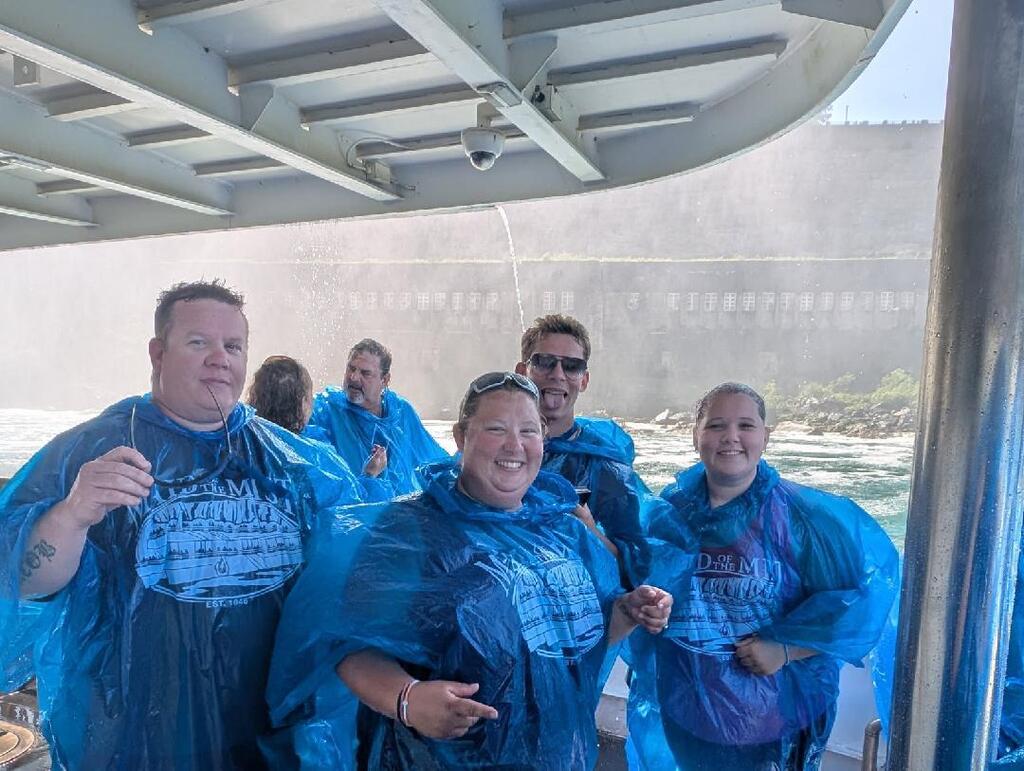 The schuette family on the maid of the mist wearing the rain panchos