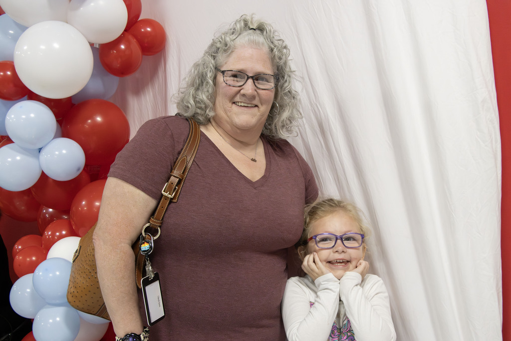 grandparent smiling with their grandchild
