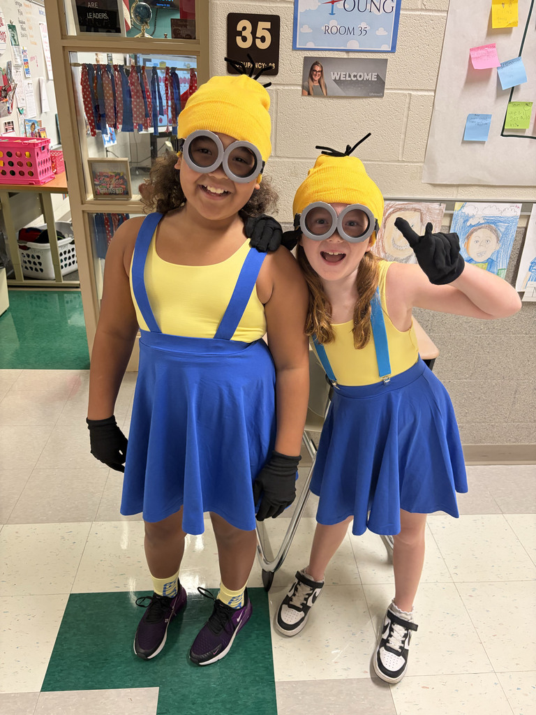 Two student dressed alike as minions from the movie despicable me