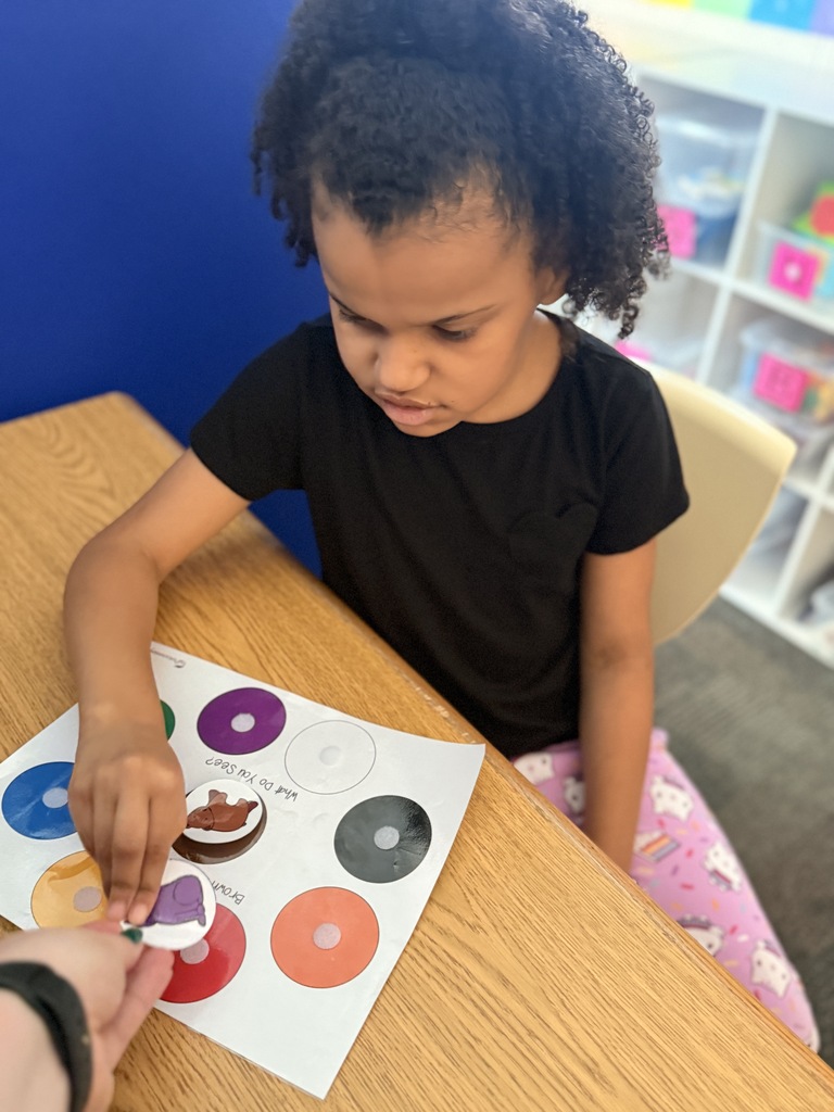 A student doing an activity at a table