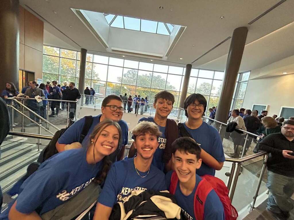 6 of the students pose together for a picture