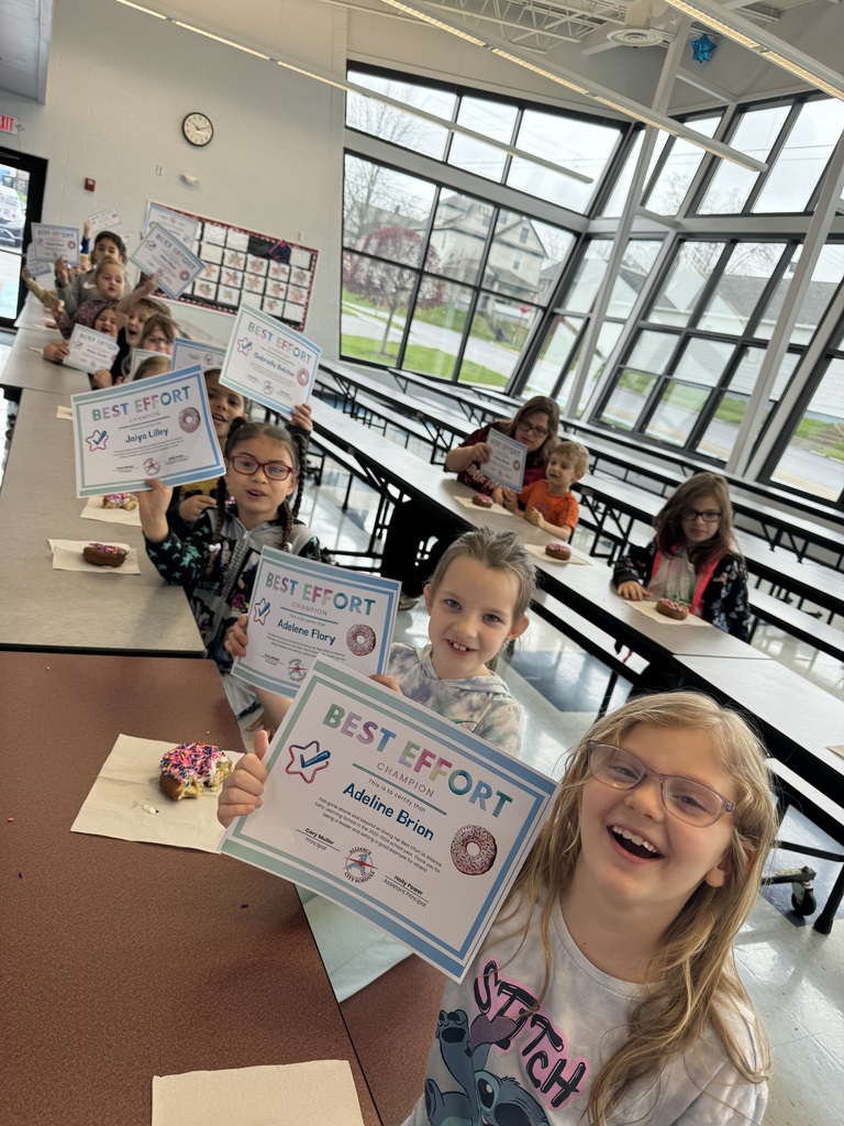 students eating donuts