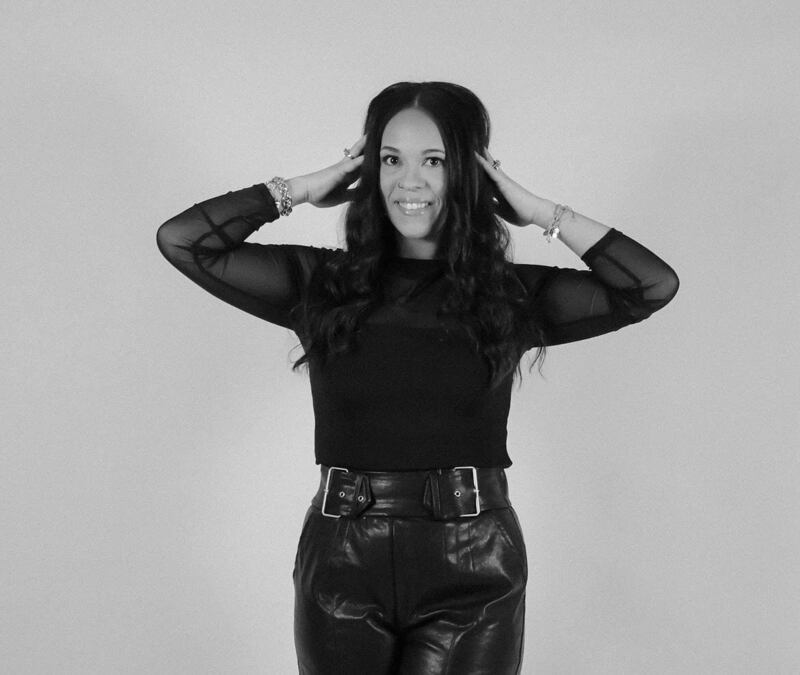 a black and white photo of devyn