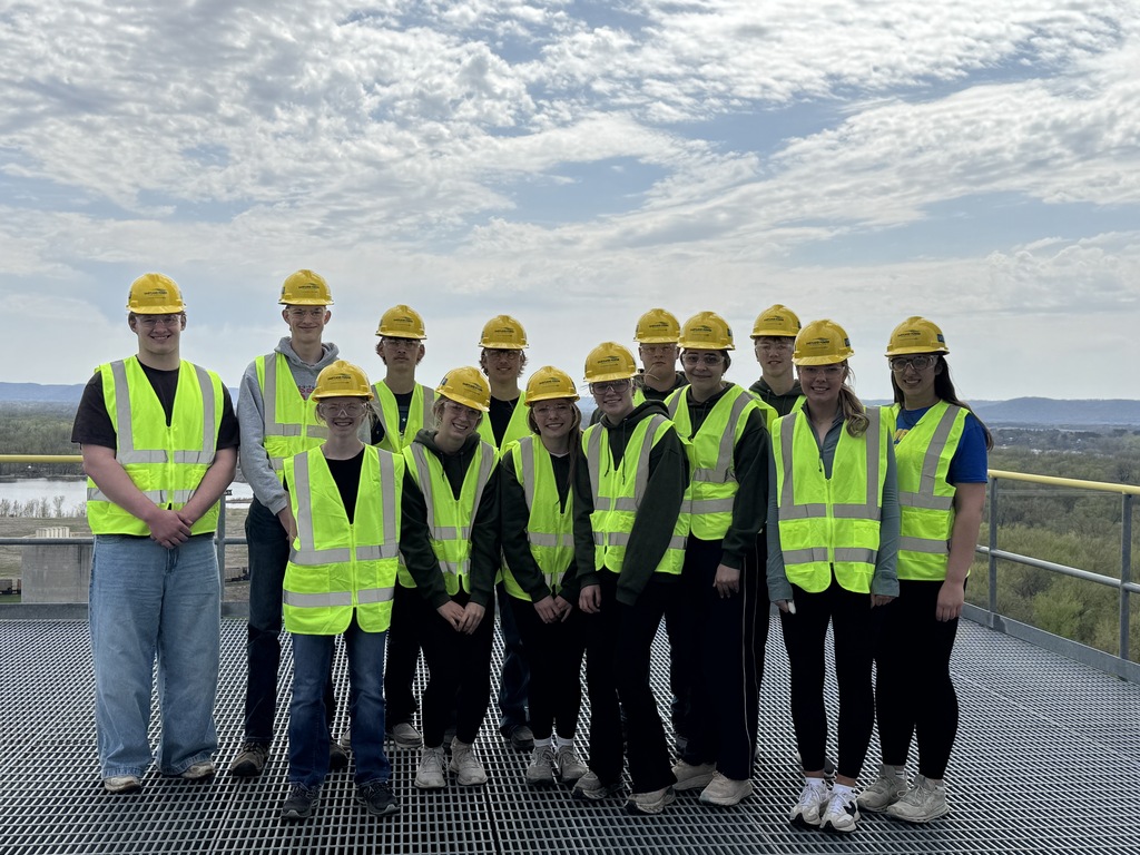 Riverland Amabassadors smiling at the camera while touring the JPM power plant. 