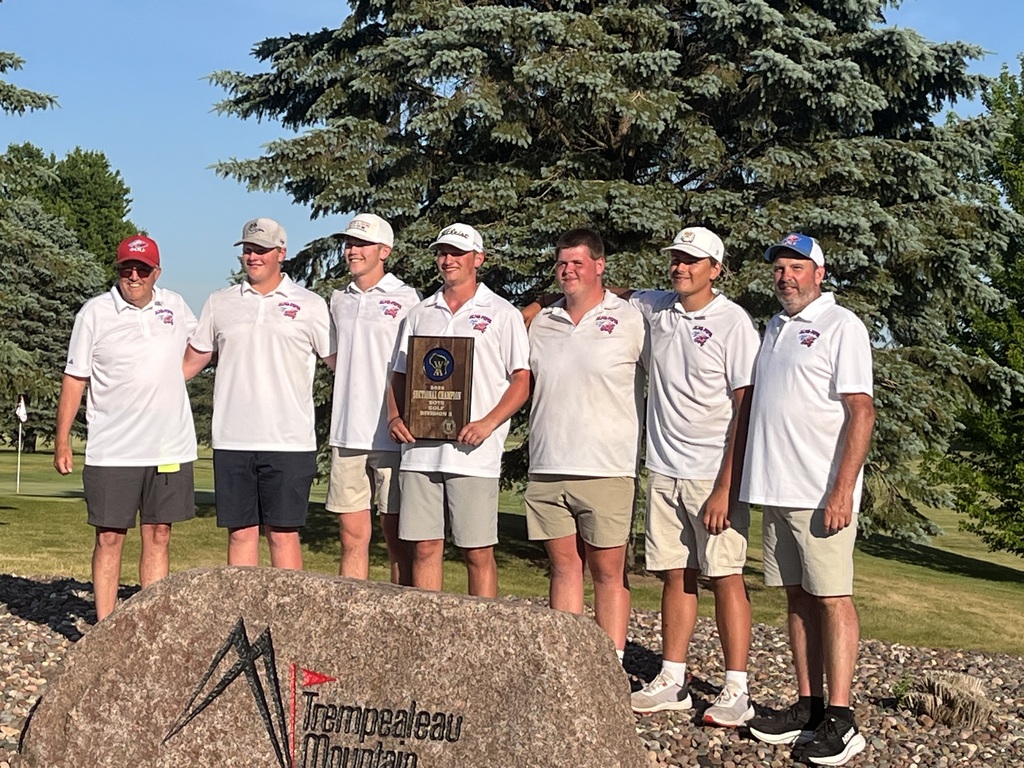 Photo of Alma Pepin golf team with sectional champs plaque.
