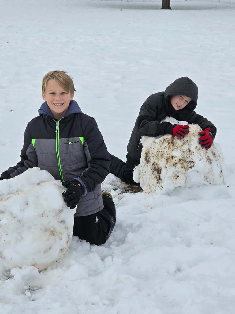 Creating gaint snowballs for our snowman.