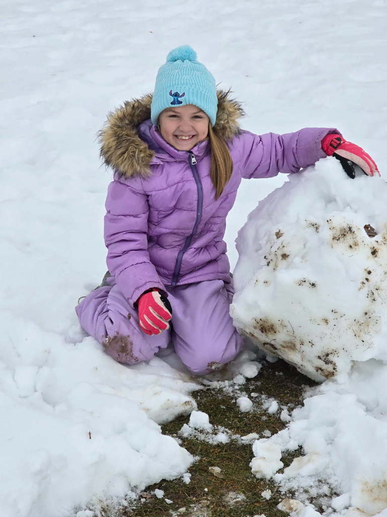 Smiles come when you build a snowman.