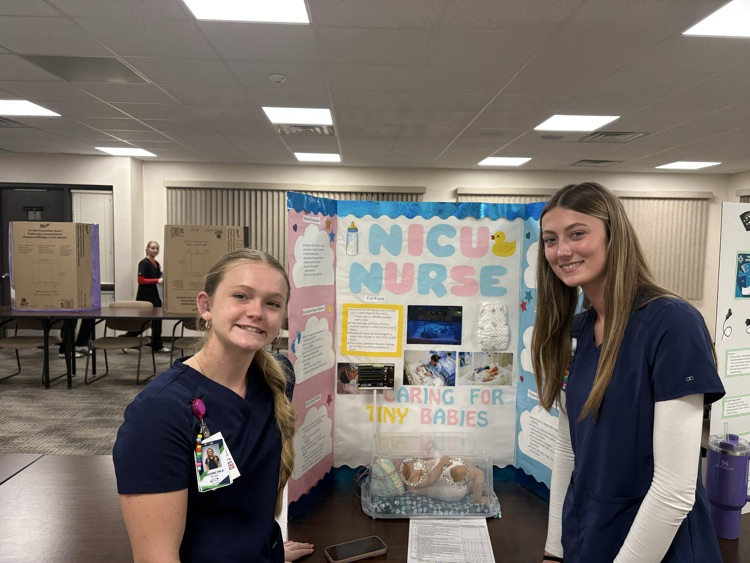 students at health comp display