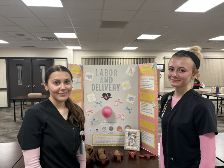students at health comp display 