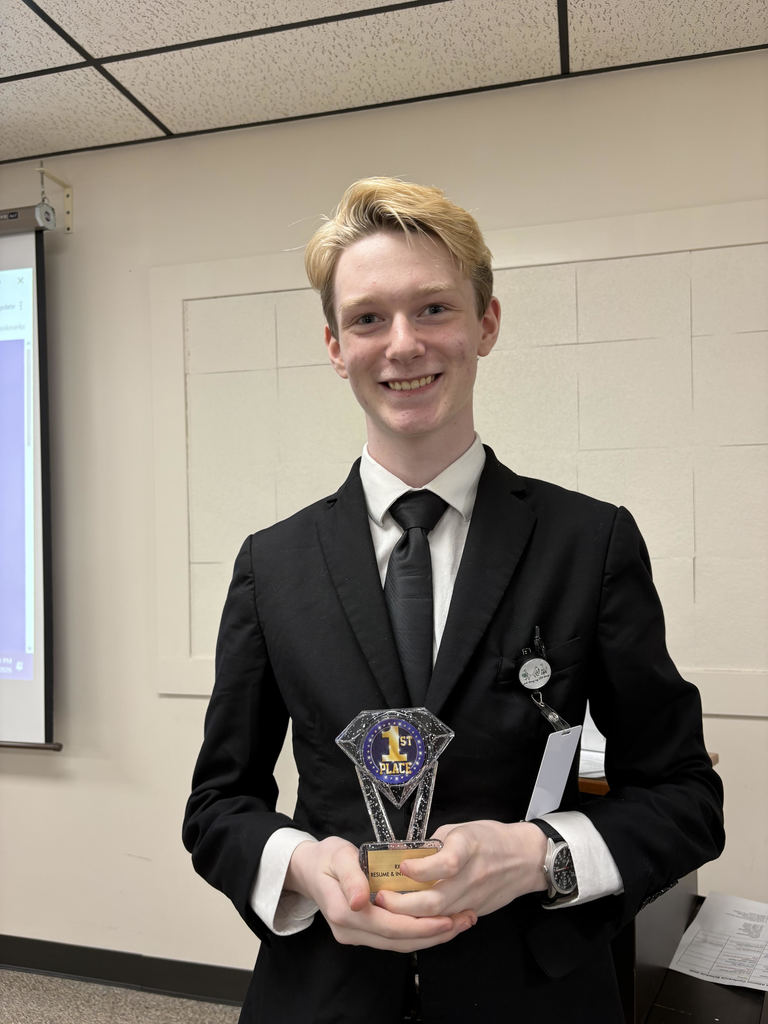 Alex with trophy