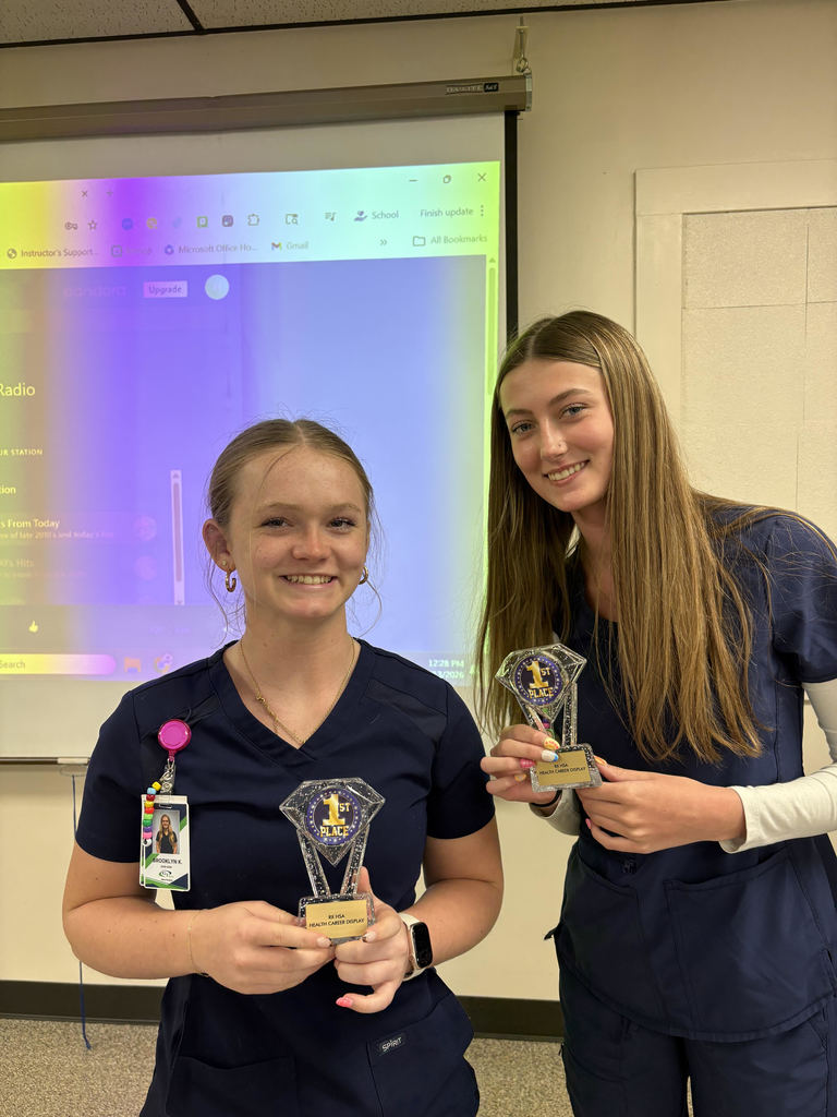 Students with trophies