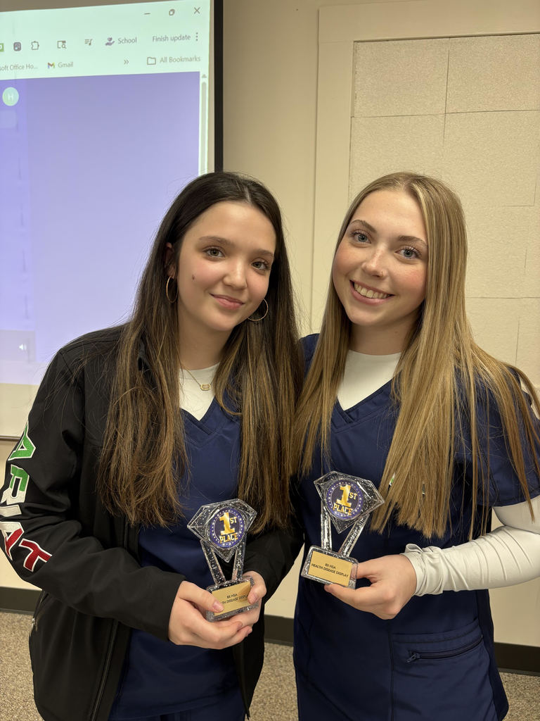 Students with trophies