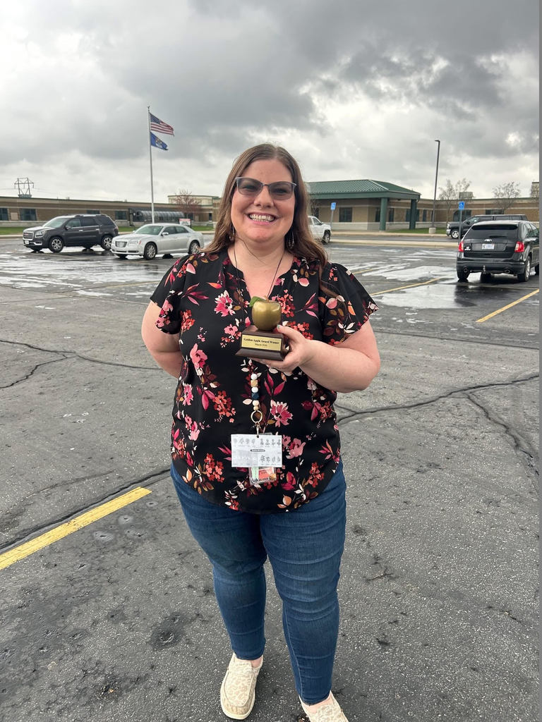 Ashley with Golden Apple award