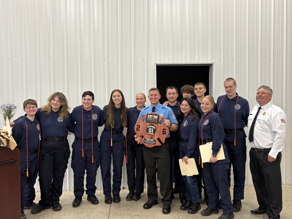 Firefighting grads with Chief and instructor