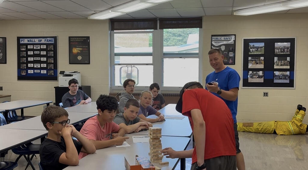 CTE summer camp students doing Jenga activity