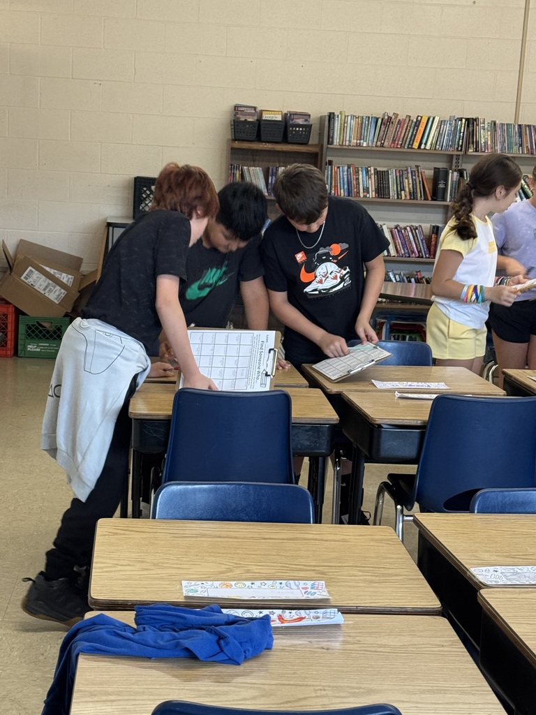 5th graders working hard in the classroom learning math