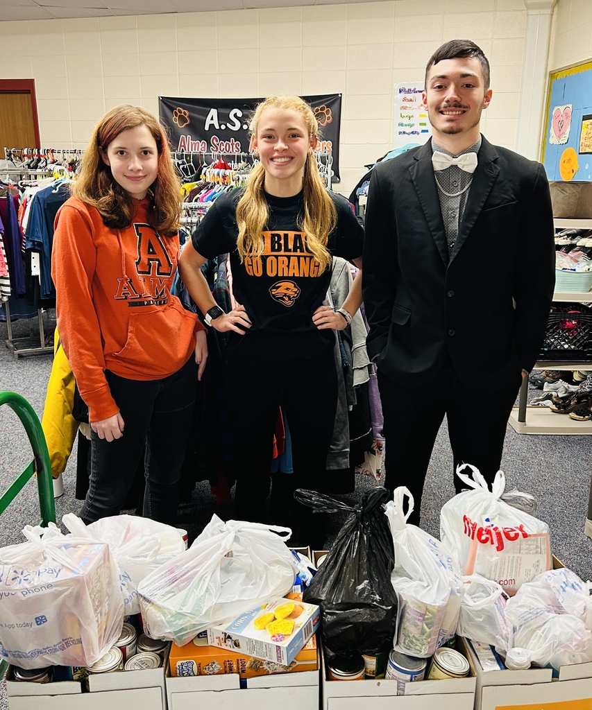 Pictured with donations are Sherri Wolfe (Panther Den), Hannah Raglin (Student Council), and Nick Batista (Varsity Boys Basketball).