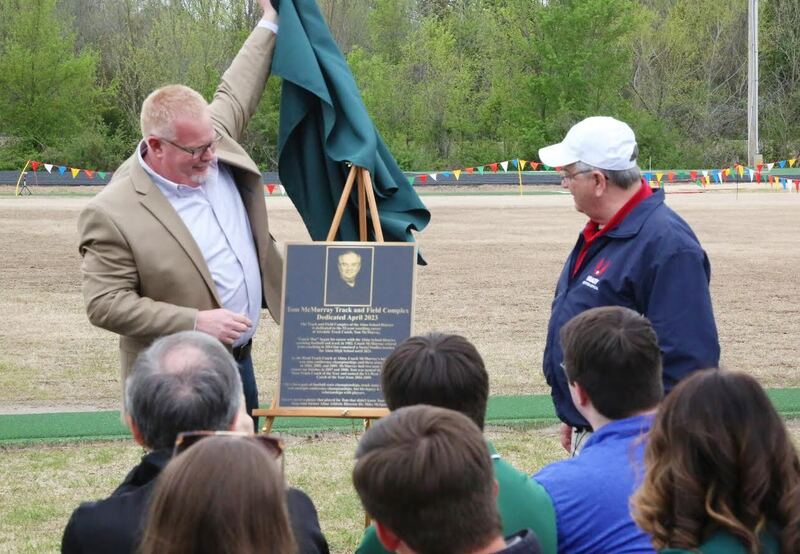 On April 6, 2023, Alma renamed the track at Alma Intermediate School in Tom McMurray's name. Former Alma athletics director Doug Loughridge (left) and McMurray.