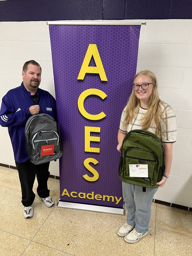TJ Hoes State Farm donates 2 backpacks of school supplies to ACES Academy