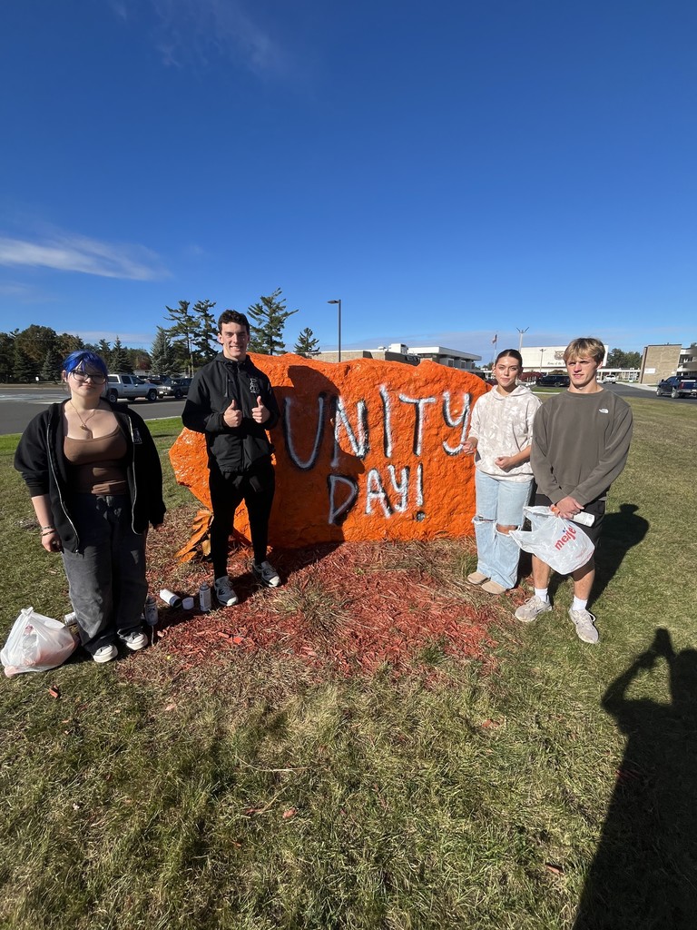 Leadership Students Painting the Rock at AHS for Unity Day in Kindness Month