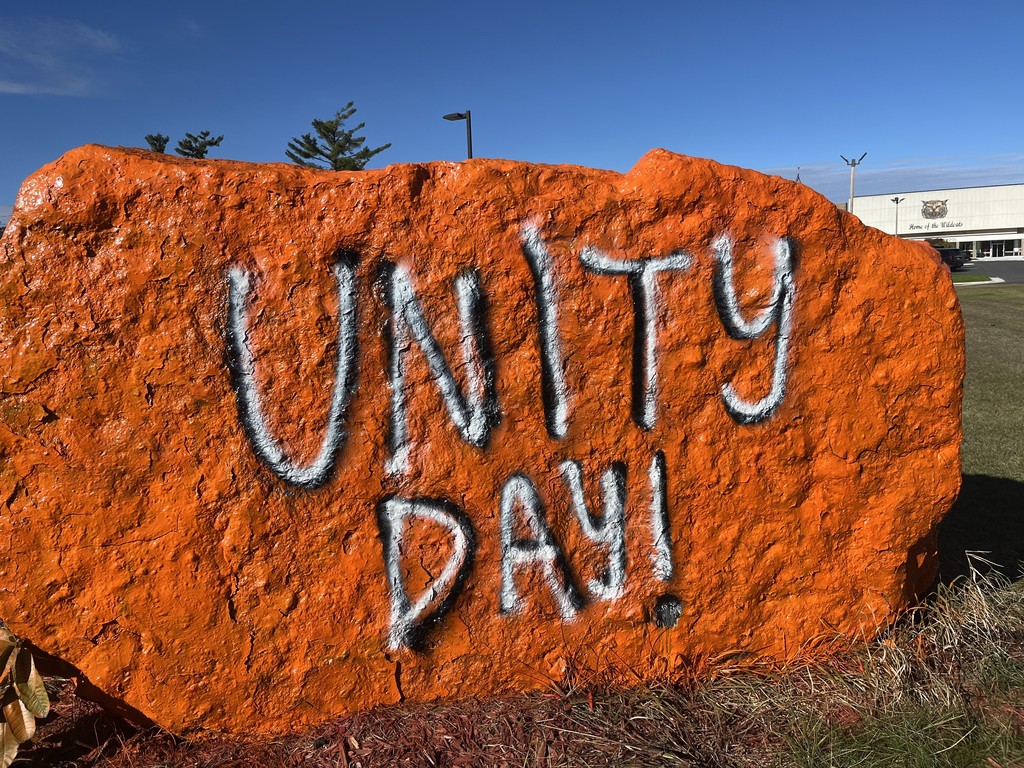 Leadership Students Painting the Rock at AHS for Unity Day in Kindness Month