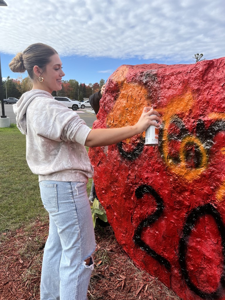 Leadership Students Painting the Rock at AHS for Unity Day in Kindness Month
