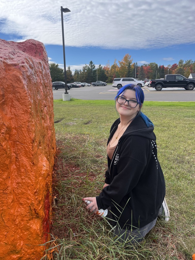 Leadership Students Painting the Rock at AHS for Unity Day in Kindness Month