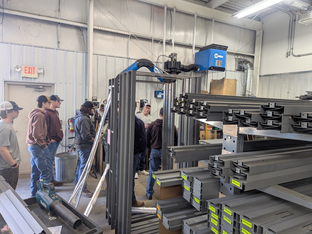 Construction trades students visited Alpena Glass and Frank's Key and Lock to learn about specialty careers.