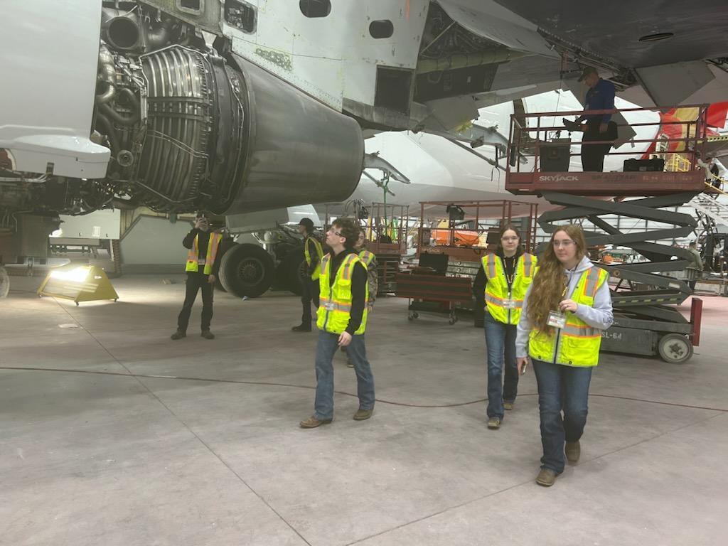 CTE students from multiple programs visit Kalitta Air in Oscoda to better understand potential careers related to mechanical and engineering in aeronautics.