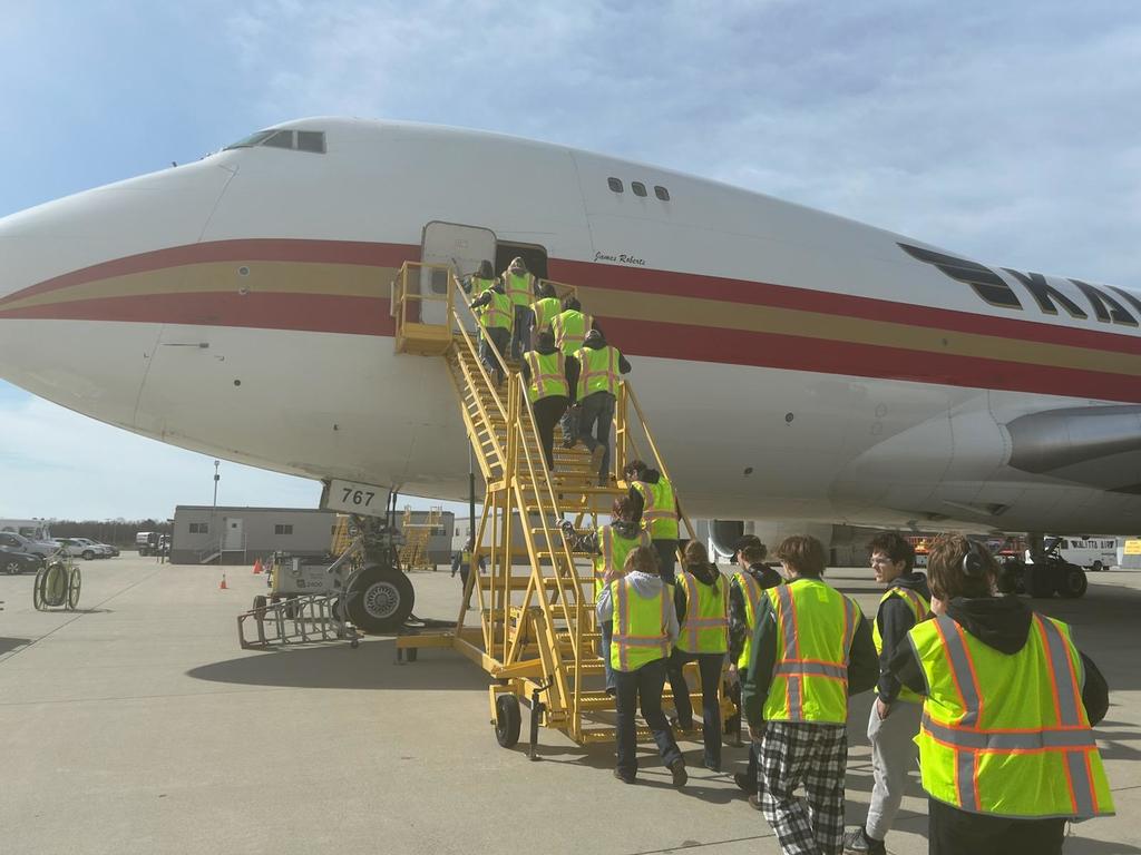 CTE students from multiple programs visit Kalitta Air in Oscoda to better understand potential careers related to mechanical and engineering in aeronautics.