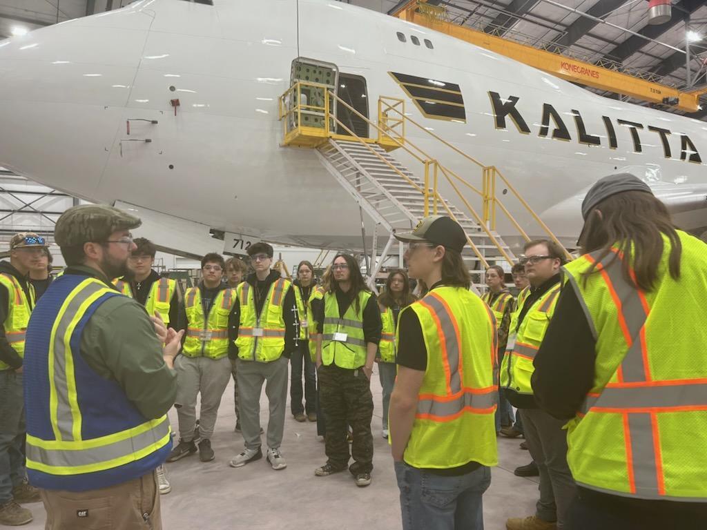 CTE students from multiple programs visit Kalitta Air in Oscoda to better understand potential careers related to mechanical and engineering in aeronautics.