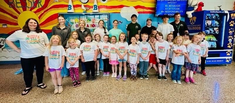 AMP UP Algebra/Manufacturing students work with Besser First Graders